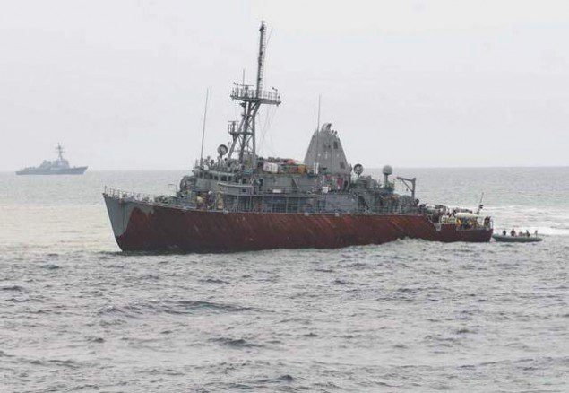 USS Guardian grounded on