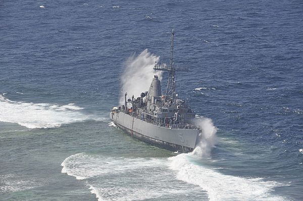 SULU SEA (Jan. 29, 2013) Heavy waves crash against the grounded mine countermeasure ship USS Guardian (MCM 5), which ran aground on the Tubbataha Reef in the Sulu Sea on Jan. 17. U.S. Navy Photo