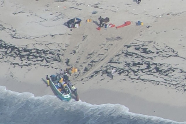 During counter piracy patrols in April, EU NAVFOR forces spotted this group of pirates setting off from a beach in Somalia. Photo: EU NAVFOR